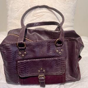 Great multi purpose Elizabeth Arden bag. Stylish faux snake and suede purple.